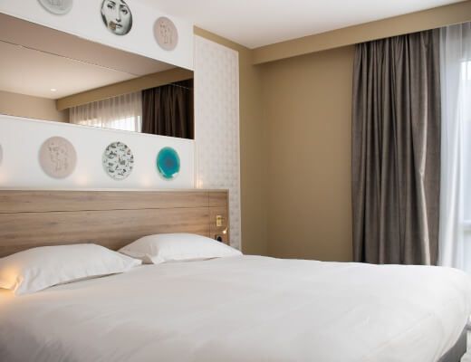 Une chambre du Brit Hotel nantes Vigneux