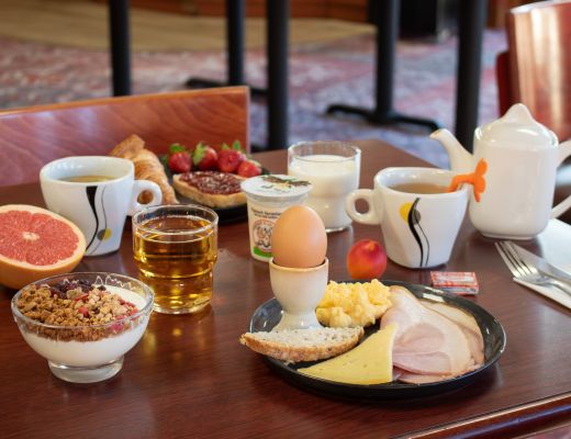 Breakfast served at a table in a restaurant in Agen